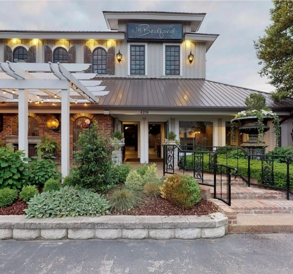 Garden arbor, pergola, and entrance landscaping at The Bedford (Source: The Vendry)