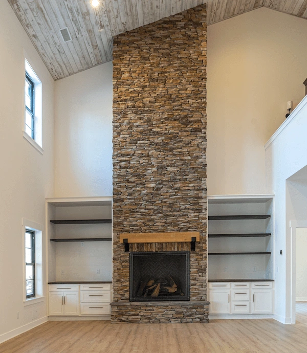 Custom new build tall stone fireplace